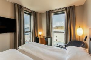 Postel nebo postele na pokoji v ubytování Comfort Hotel Bodø