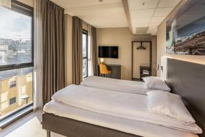 Postel nebo postele na pokoji v ubytování Comfort Hotel Bodø