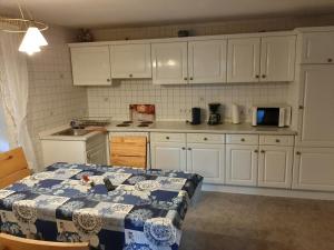 Kuchyň nebo kuchyňský kout v ubytování Gästehaus Rüger
