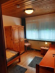 Postel nebo postele na pokoji v ubytování Gästehaus Rüger