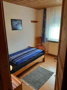 Postel nebo postele na pokoji v ubytování Gästehaus Rüger