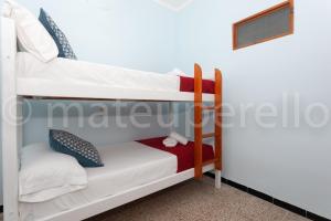 Postel nebo postele na pokoji v ubytování Cas Padri Xic + 17 fotografií