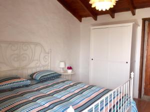 A bed or beds in a room at Finca Los Llanitos