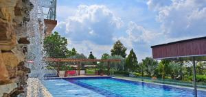 Bazén v ubytování Hacienda Isabela Hotel Campestre nebo v jeho okolí