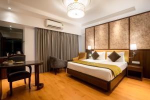 Cama ou camas em um quarto em Freesia By Express Inn