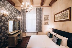 Posteľ alebo postele v izbe v ubytovaní Native Apartments Dunajewskiego 2