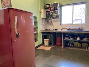 A cozinha ou cozinha compacta de Shree Bungalow
