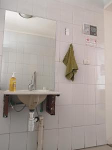 Um banheiro em Hostal Vitalia