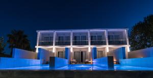 Photo de la galerie de l'établissement Belussi Beach Hotel & Suites, à Kypseli