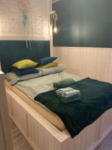 A bed or beds in a room at Villa Kokosowa