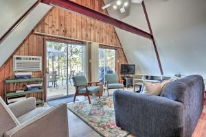 a living room with a couch and chairs at Cozy Toledo Bend A-Frame with Waterfront Views! in Burkeville