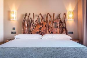 Postel nebo postele na pokoji v ubytování Tarifa Lances by QHotels