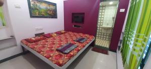 Imagine din galeria proprietății Adarsh Niwas în Malvan +5 fotografii