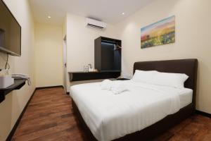 Postel nebo postele na pokoji v ubytování Hotel Le-Shore
