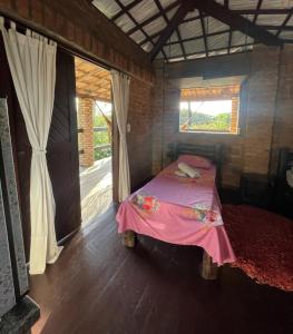 Ένα ή περισσότερα κρεβάτια σε δωμάτιο στο Hostel do Ceu
