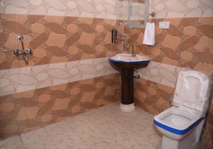 Kúpeľňa v ubytovaní Laxmi Residence
