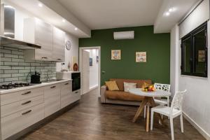 Кухня или мини-кухня в Resort Villa La Perla Sul Mare
