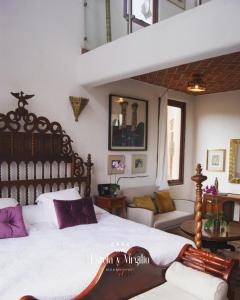 Ένα ή περισσότερα κρεβάτια σε δωμάτιο στο Casa Estela y Virgilio B&B