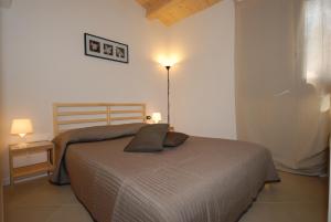 Cama o camas de una habitación en MG Casevacanza