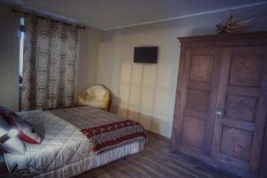 Postel nebo postele na pokoji v ubytování Maison Lucien