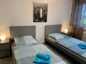 Uma cama ou camas num quarto em Ruhrpott-Liebe