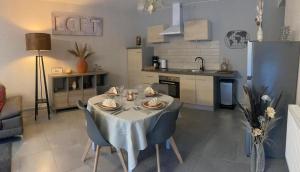 Kuchyň nebo kuchyňský kout v ubytování Le Loft + 37 fotografií