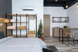 Postel nebo postele na pokoji v ubytování Lexum by Bernalo Hotels