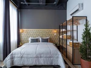 Postel nebo postele na pokoji v ubytování Lexum by Bernalo Hotels + 37 fotografií
