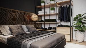 a bedroom with a bed and shelves with clothes at Lexum by Bernalo Hotels in Medellín