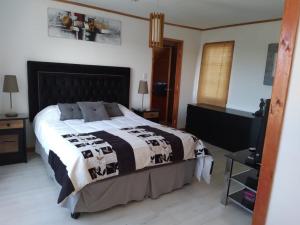 Giường trong phòng chung tại Ensueño de Rapel , Costa del Sol