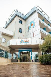 a hotel entrance with the front of a building at Hotel Amico in Citta' Sant'Angelo