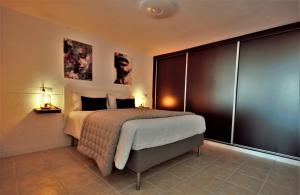 Posteľ alebo postele v izbe v ubytovaní Apartamento a tan solo 2 minutos de la playa