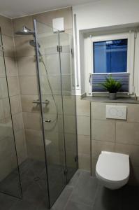 Ένα μπάνιο στο neue 2-Zimmerwohnung in Hochdorf