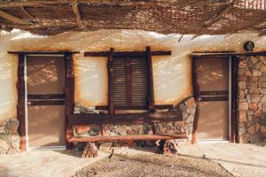 a window on the side of a stone building at Sayadeen Village - Red Sea Riviera in Nuweiba
