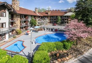an aerial view of a hotel with a swimming pool at River Edge Inn in Gatlinburg