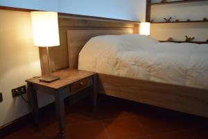 Postel nebo postele na pokoji v ubytování Villas Catalina + 28 fotografií