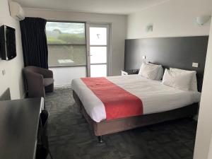 Posteľ alebo postele v izbe v ubytovaní Brighton Hotel Motel