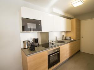 Kjøkken eller kjøkkenkrok på Appartement Les Arcs 1800, 4 pièces, 6 personnes - FR-1-352-32