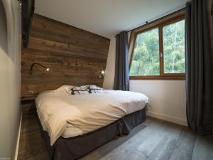 Appartement Les Arcs 1800, 4 pièces, 8 personnes - FR-1-352-22房間的床