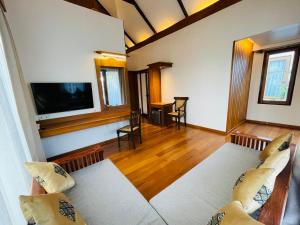 TV a/nebo společenská místnost v ubytování Bagan Cottage Boutique Hotel