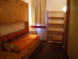 Appartement Méribel, 1 pièce, 4 personnes - FR-1-355-59にあるシーティングエリア