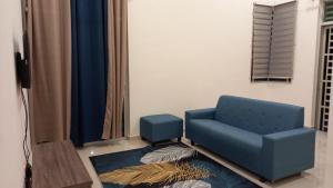 Posezení v ubytování Homestay Zaki D'Gerik