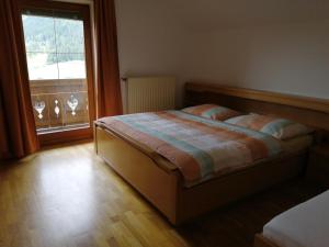 Posteľ alebo postele v izbe v ubytovaní Ferienhaus Sonnenseite