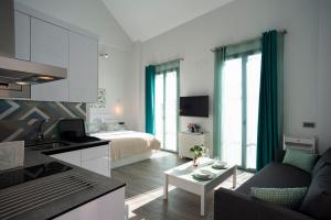Kuchyňa alebo kuchynka v ubytovaní EM21 Apartamentos