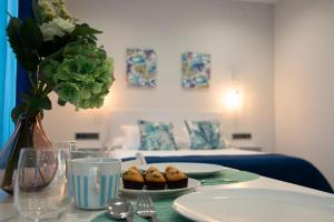 Posedenie v ubytovaní EM21 Apartamentos