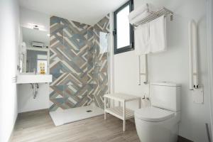 Kúpeľňa v ubytovaní EM21 Apartamentos