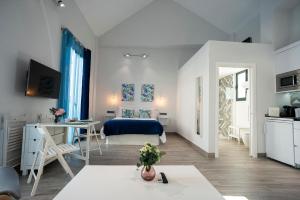 Kuchyňa alebo kuchynka v ubytovaní EM21 Apartamentos