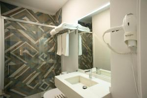 Kúpeľňa v ubytovaní EM21 Apartamentos