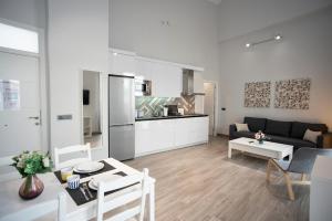 Kuchyňa alebo kuchynka v ubytovaní EM21 Apartamentos