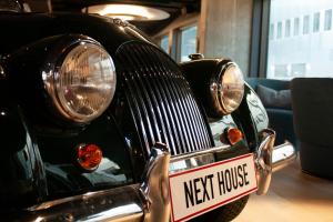 a close up of the front of a next house car at Next House Copenhagen in Copenhagen